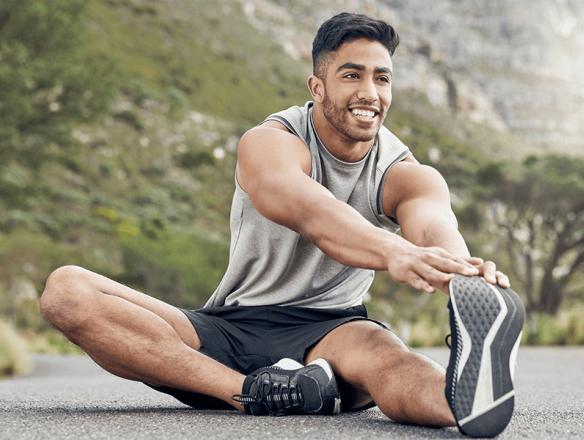 Runner stretching joints before a run